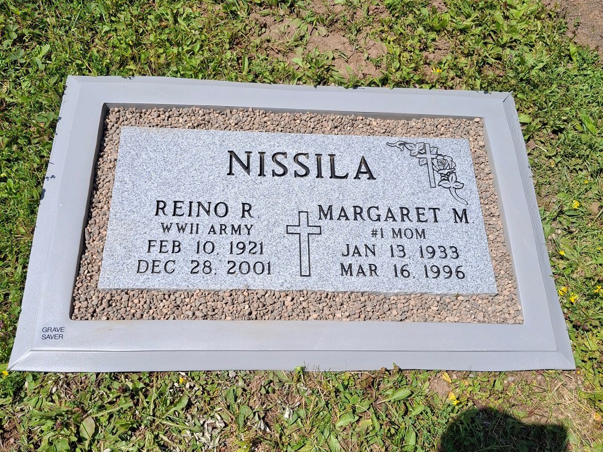 Flat granite marker set flush in a Grave Saver frame, photo 1 of 12